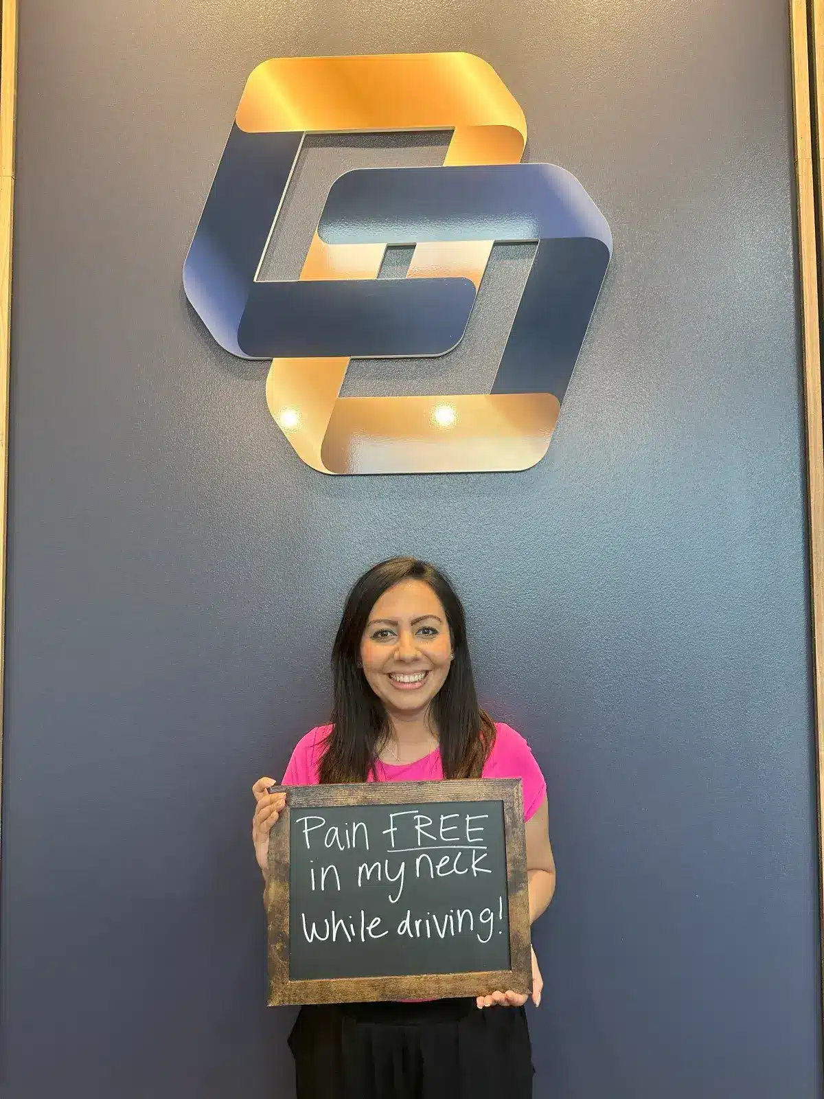 Female patient delighted to be "Pain FREE in my neck while driving!" after treatment from her chiropractor in Alliance, also serving North Fort Worth.