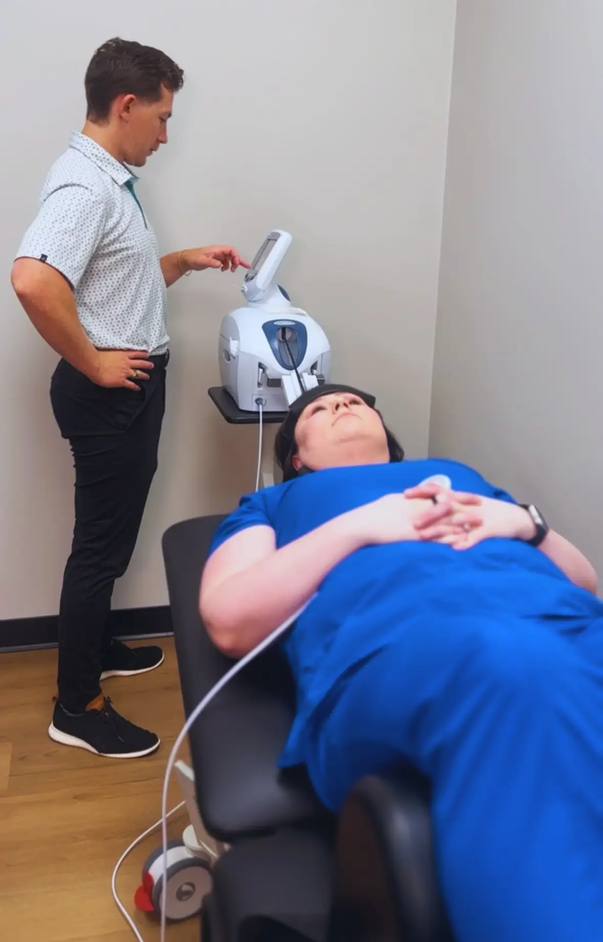 Dr. Seth Little performing spinal decompression therapy on a patient at Limitless Chiropractic in Alliance Town Center, Fort Worth