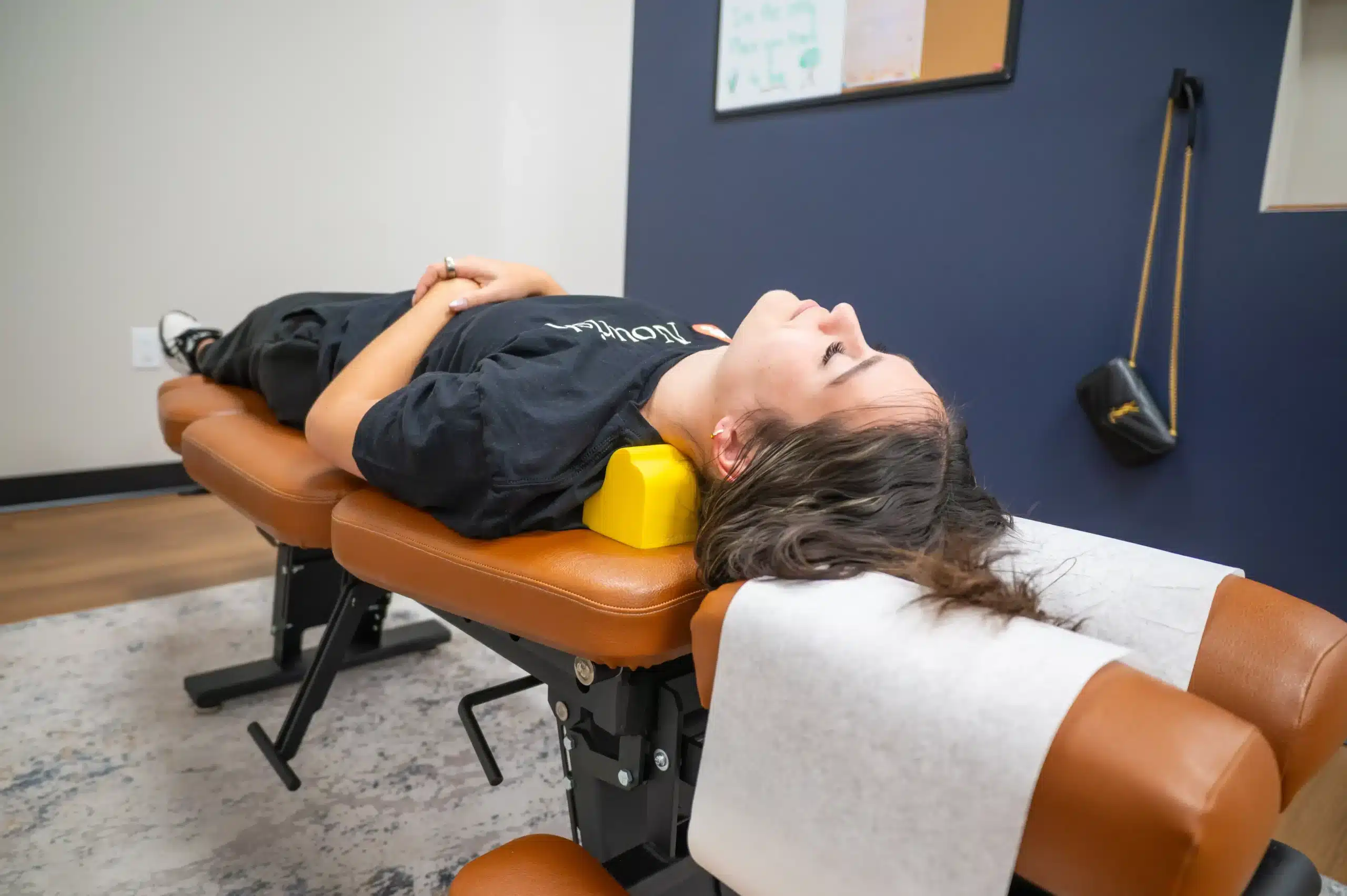 Intersegmental traction therapy supporting the neck and spine during chiropractic treatment